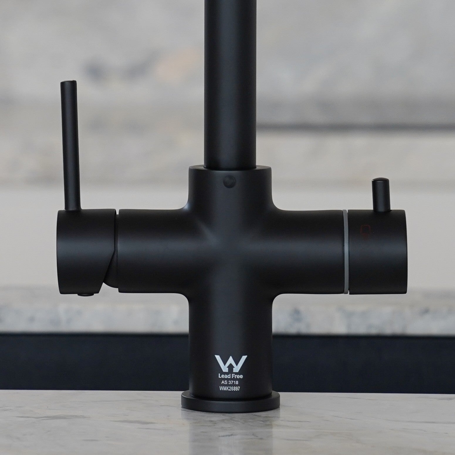 Alia lead-free watermarked kitchen tap in matte black finish shown as a hot and cold water filter dispenser, designed for healthier and safer homes. Modern tapware featuring premium water filtration technology and full compliance with Australian standards.