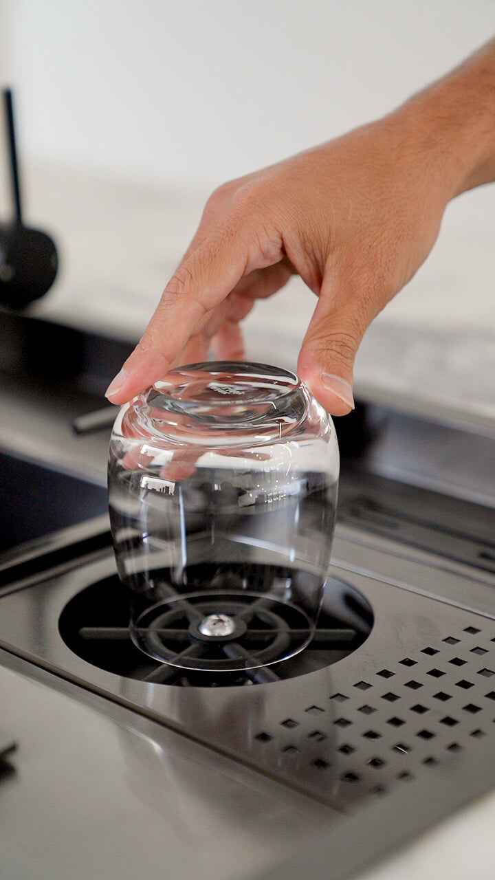 ALIA Smart Sink high-pressure jet cup and bottle washer in premium stainless steel, designed for efficient and hygienic cleaning in a modern kitchen sink.