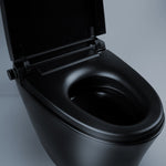 Detail shot of matte black Alia smart bidet toilet, focusing on bidet sprayer, buttons, and premium seat for advanced cleanliness and comfort.