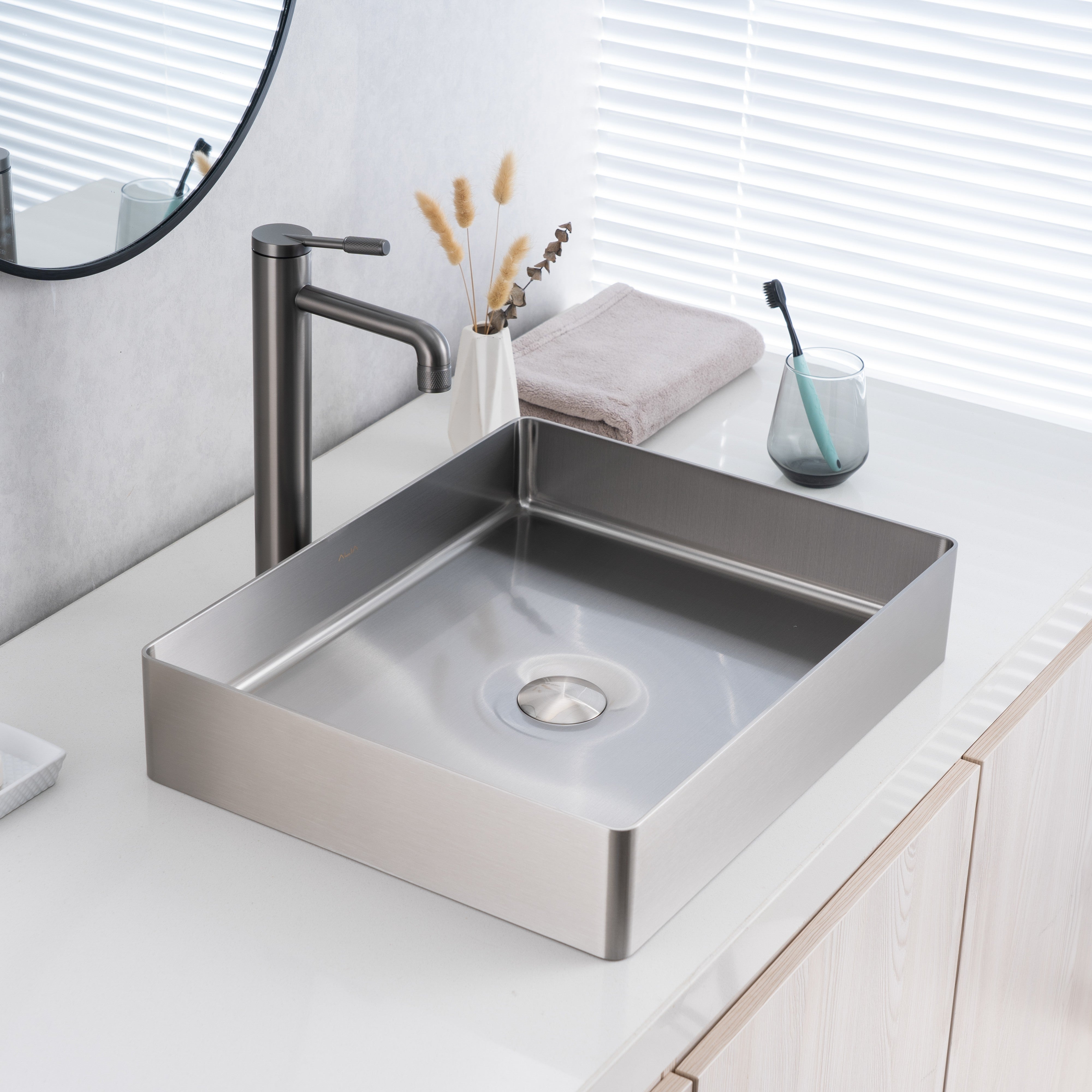 ALIA brushed silver bathroom basin in a sleek rectangular shape, offering a corrosion-resistant, easy-to-clean surface ideal for residential or commercial bathrooms.