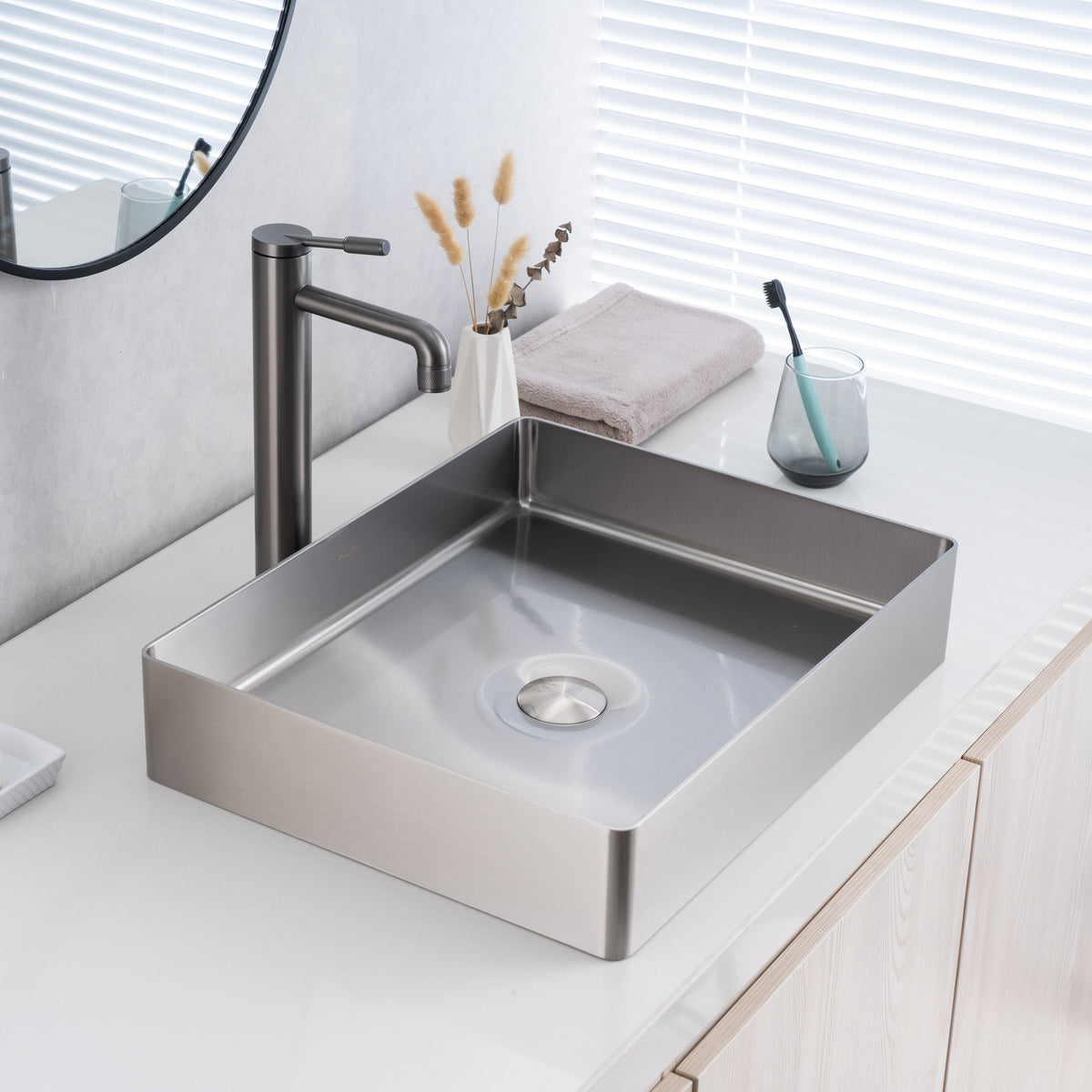 ALIA brushed silver bathroom basin in a sleek rectangular shape, offering a corrosion-resistant, easy-to-clean surface ideal for residential or commercial bathrooms.