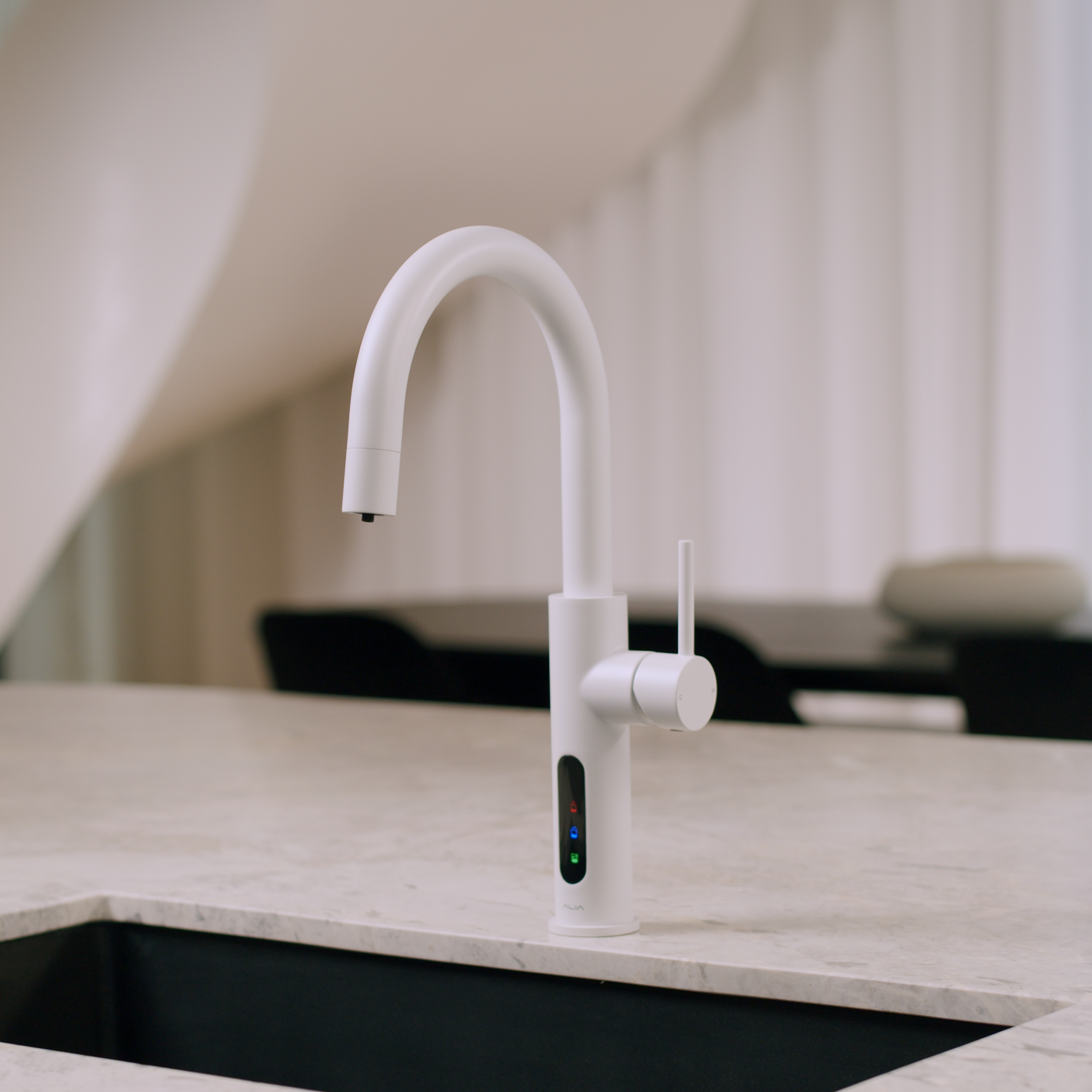 Alia X51 instant hot, cold, and sparkling filtered water tap in Stormtrooper matte white finish, designed to resemble the iconic Star Wars Stormtrooper armour, installed in a modern kitchen showcasing advanced filtration and sleek design.