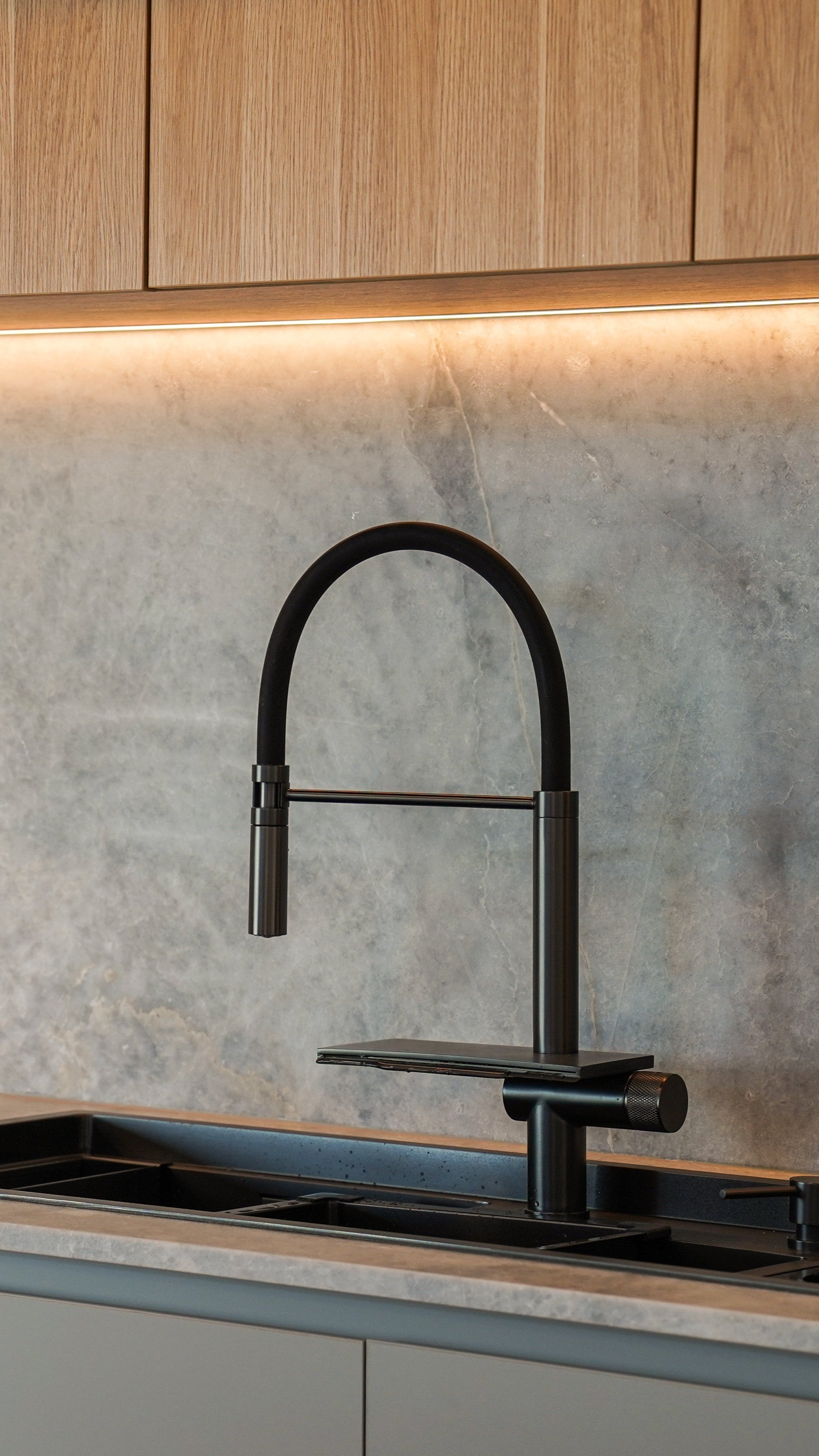 Alia Global Smart Sink 1 in a modern kitchen setting, highlighting innovative sink design with smart features for enhanced functionality and contemporary kitchen aesthetics.