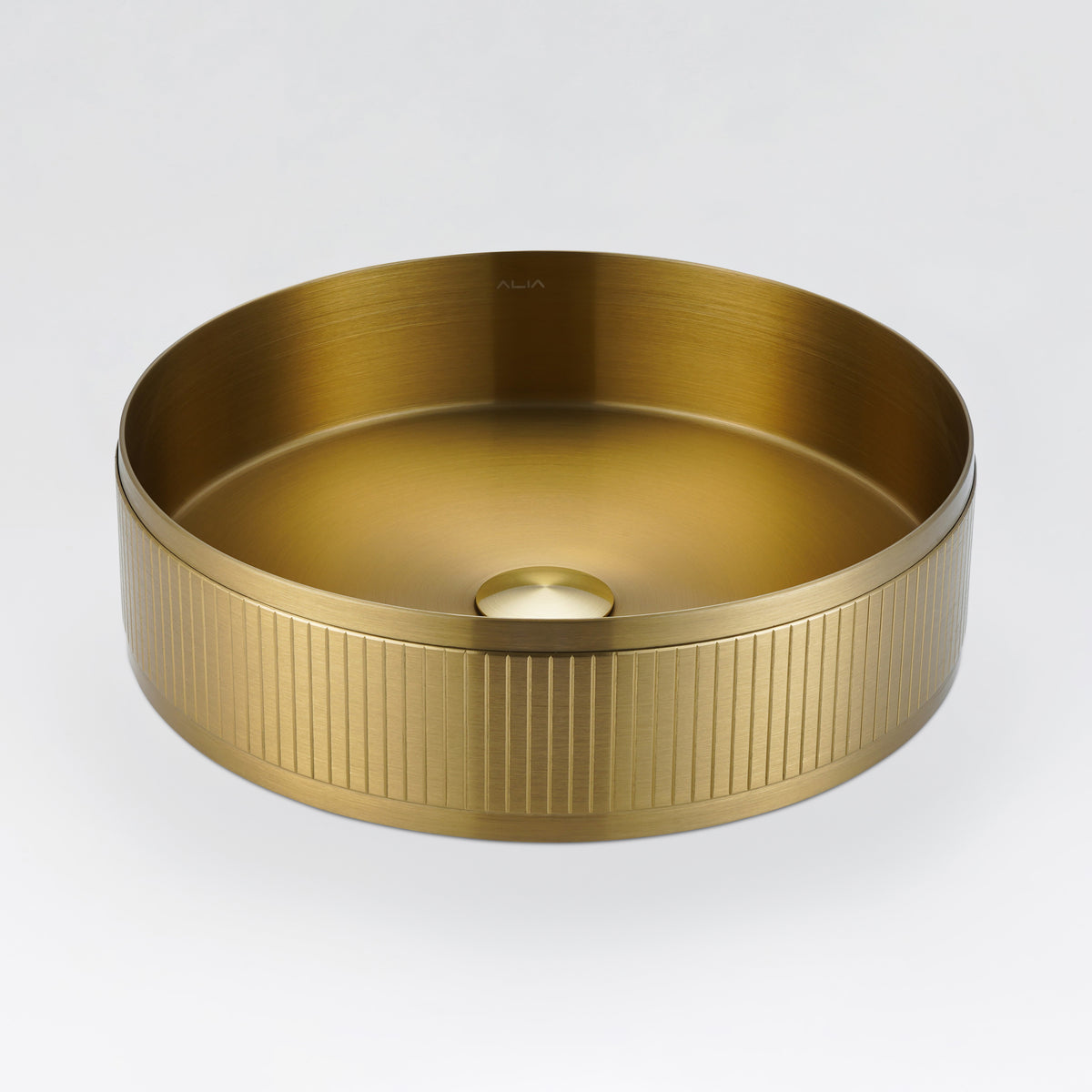 ALIA textured brushed gold above-counter basin crafted for modern interiors with a warm, opulent tone.