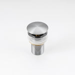 ALIA brushed silver pop-up waste drain designed to complement stainless steel basins with a matching modern brushed finish.