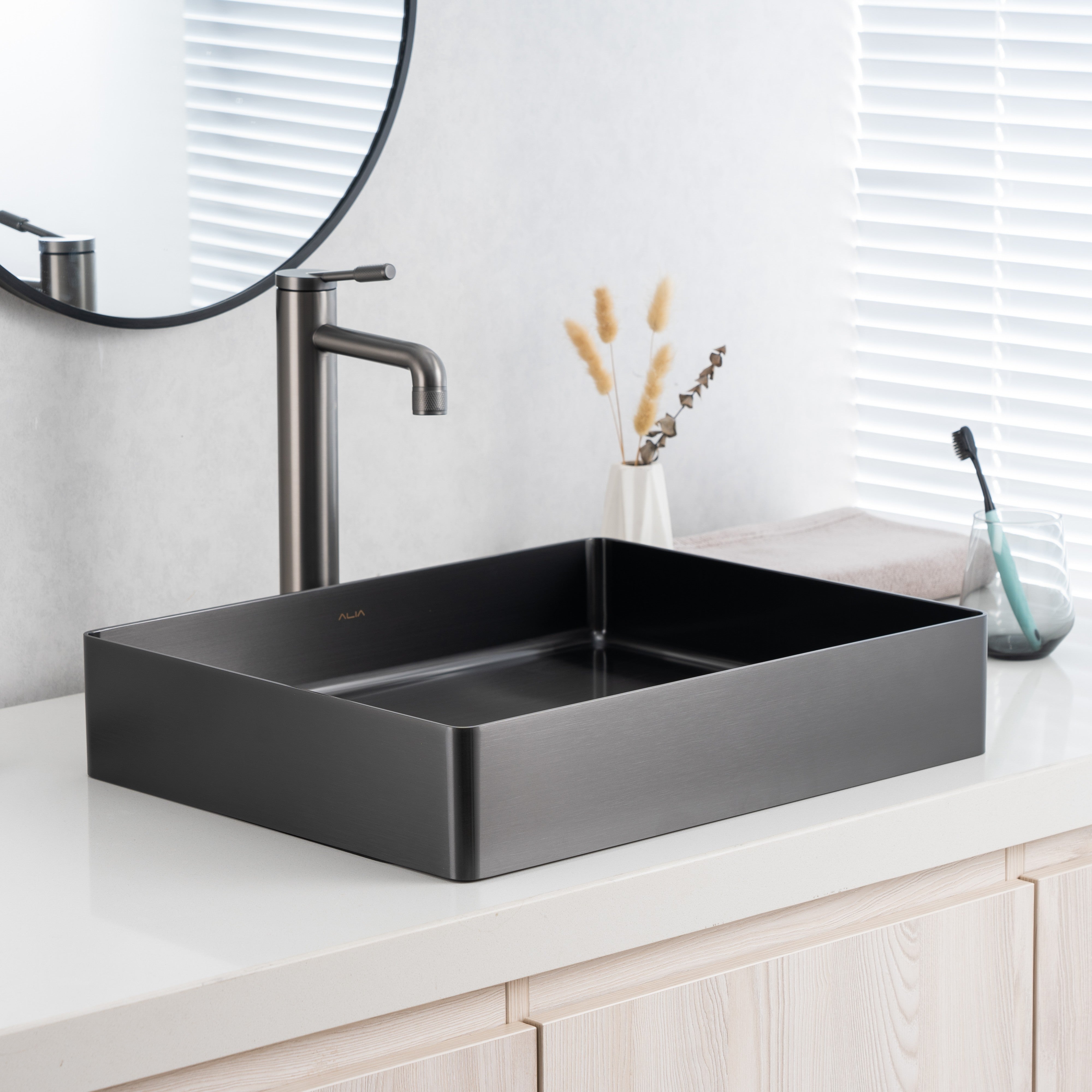 Gunmetal grey rectangular stainless steel bathroom basin, ideal for modern bathrooms or kitchens, featuring above-counter installation—premium ALIA basin sink for contemporary spaces.
