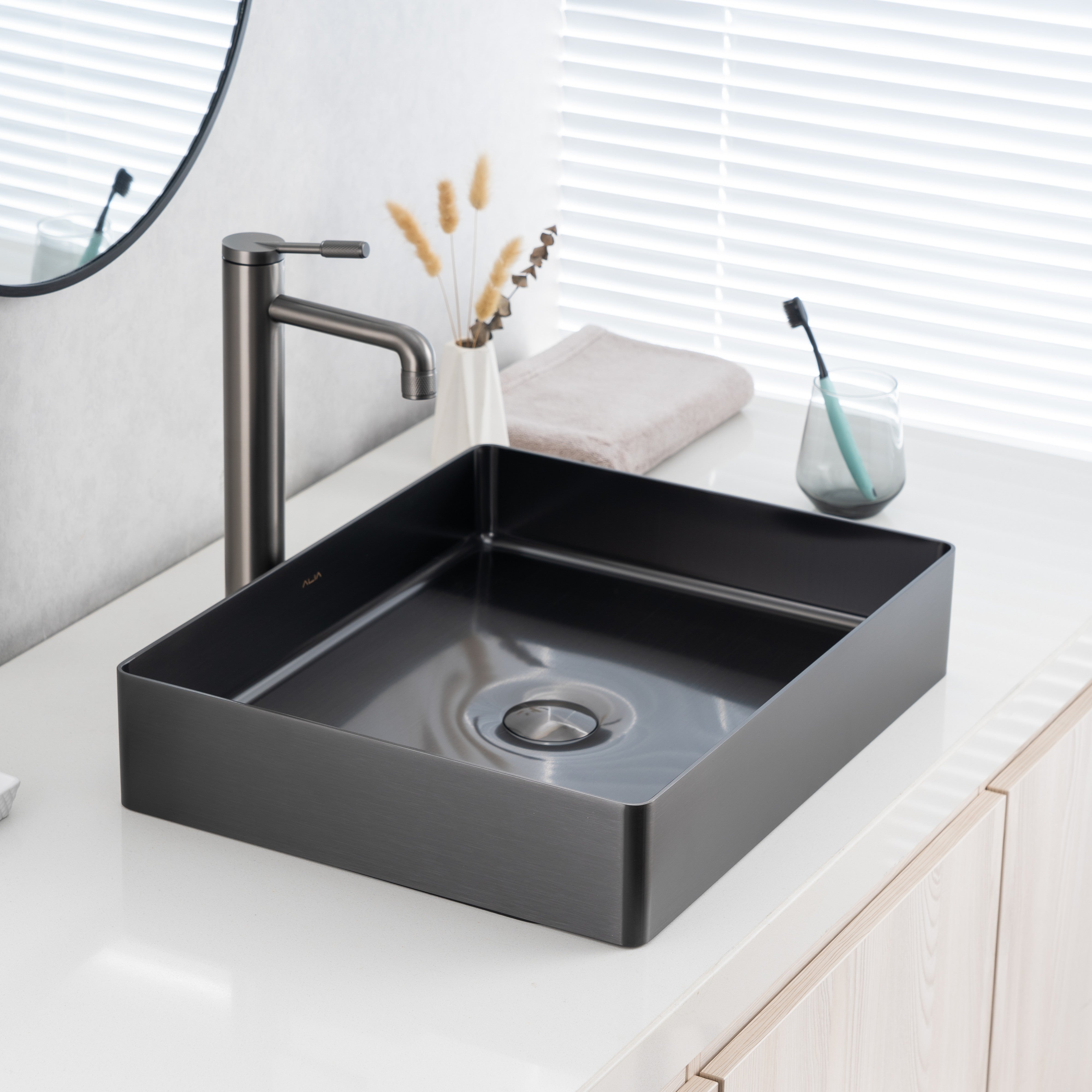 Gunmetal grey rectangular stainless steel bathroom basin, ideal for modern bathrooms or kitchens, featuring above-counter installation—premium ALIA basin sink for contemporary spaces.
