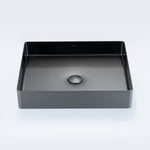 ALIA rectangular stainless steel bathroom basin in gunmetal grey displays a sleek, hygienic design, perfect as a feature sink in residential or commercial bathroom remodels.