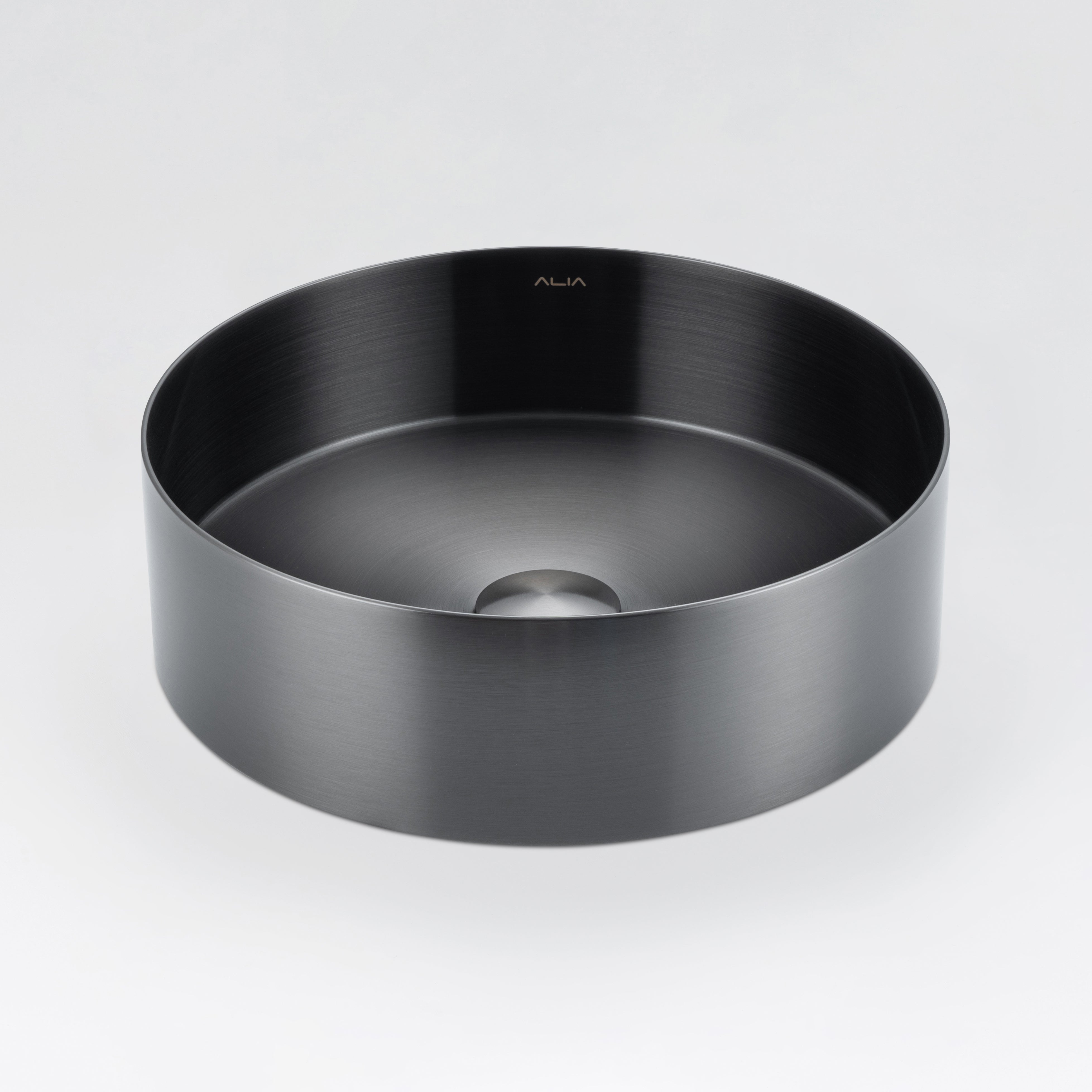 Modern ALIA above-counter bathroom basin featuring sleek gunmetal grey stainless steel for a premium look. Black round sink on a light grey background.
