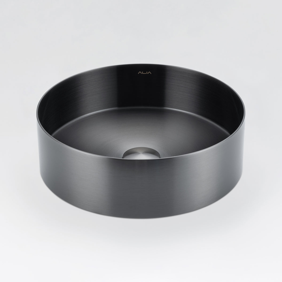 Modern ALIA above-counter bathroom basin featuring sleek gunmetal grey stainless steel for a premium look. Black round sink on a light grey background.