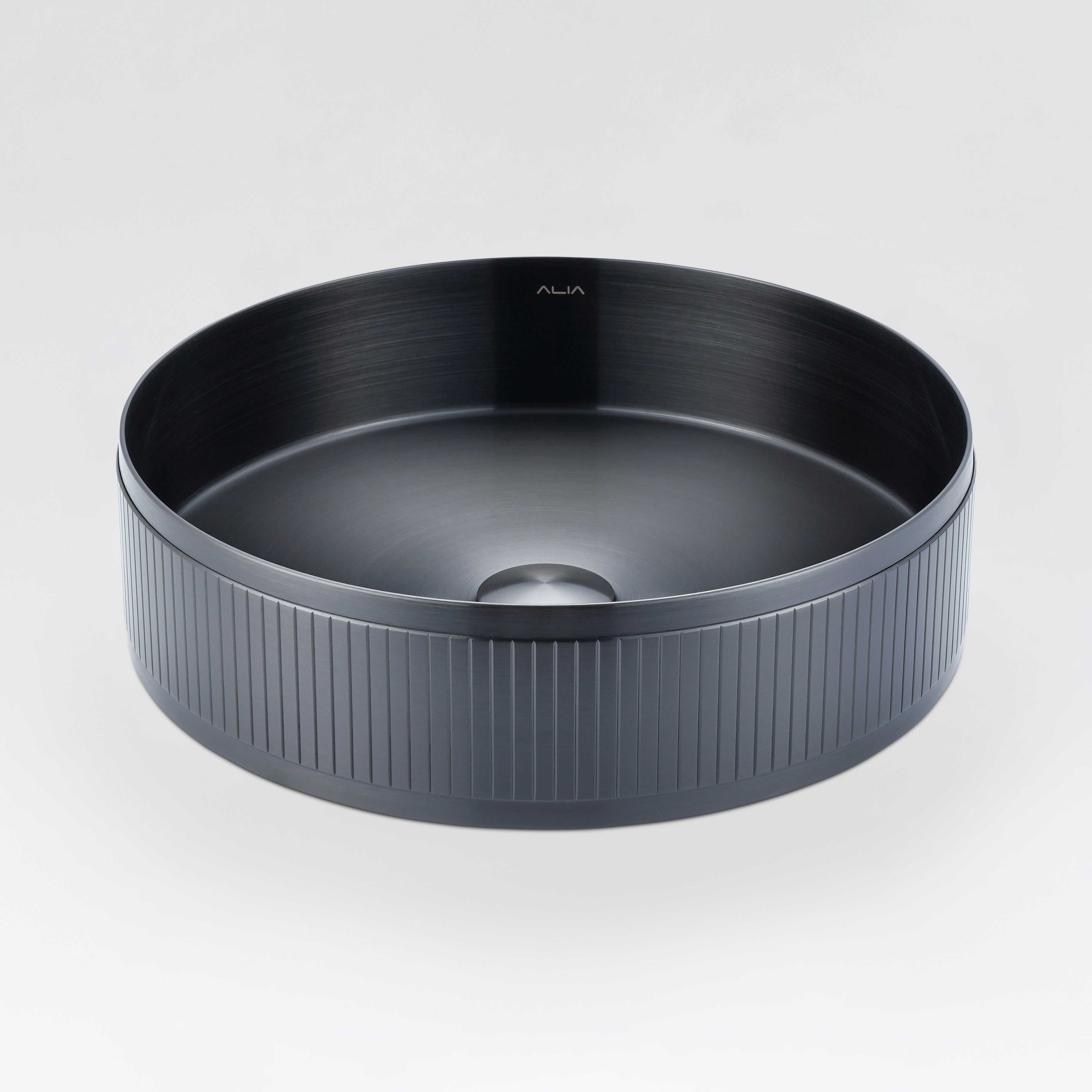 ALIA textured gunmetal grey above-counter basin designed for statement bathroom interiors with a contemporary edge.