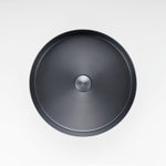 Modern textured gunmetal grey bathroom sink from ALIA, crafted for durability and striking visual depth.
