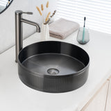 Real image of ALIA textured gunmetal grey round basin installed on a vanity, showcasing its matte surface and detailed texture.