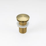 ALIA brushed gold pop-up waste drain for stainless steel basins, crafted for seamless performance and modern luxury aesthetics.